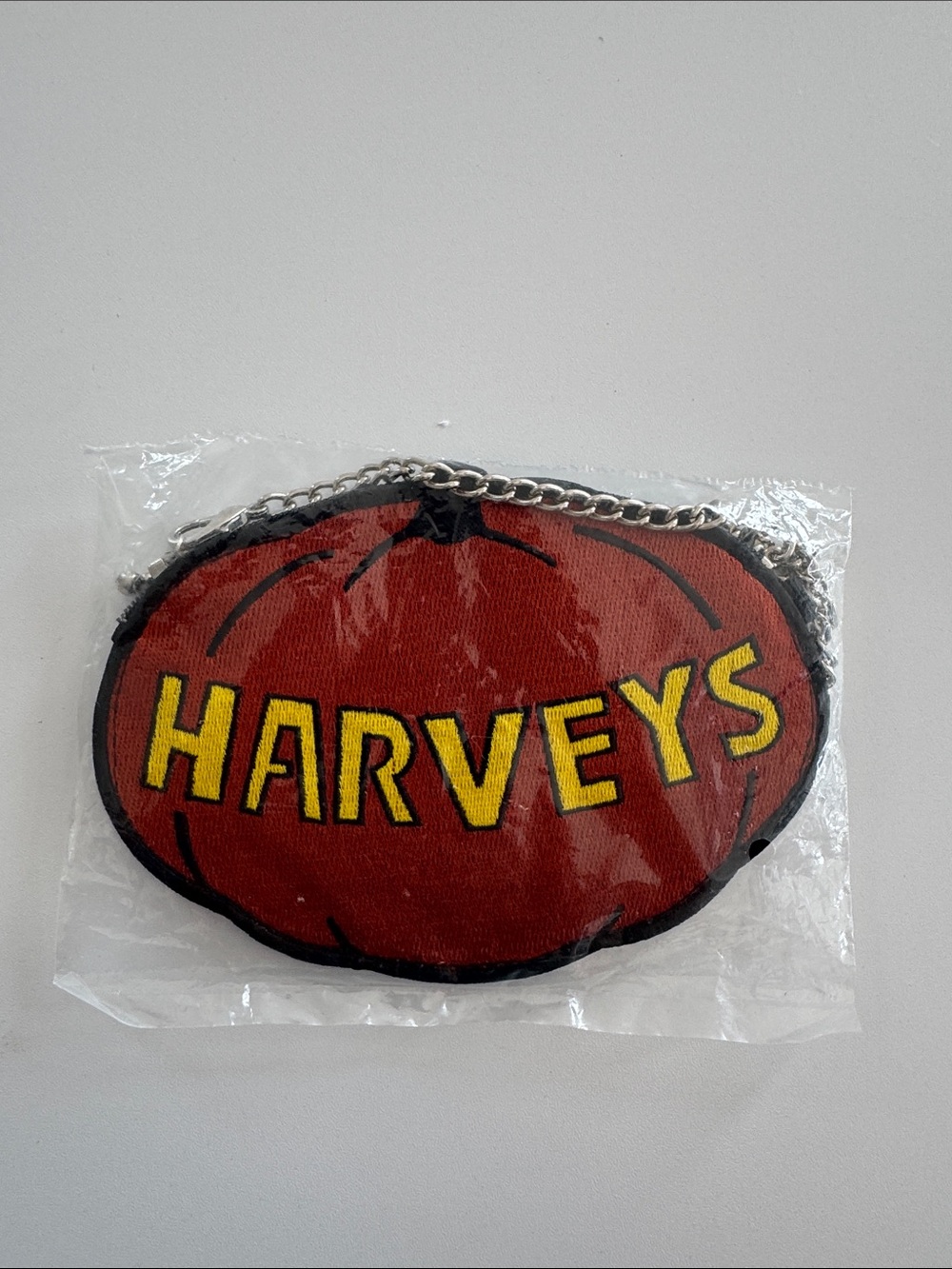 Harveys Red Pumpkin Logo Chain Pouch with Yellow Lettering coin purse